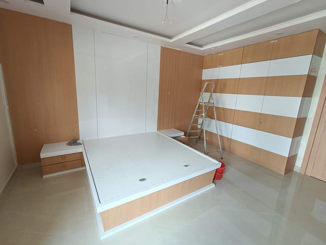 Stacked plywood panels in factory