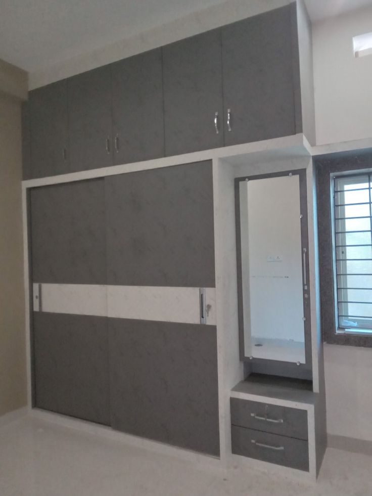 Wardrobe and storage unit fabrication by KGN Interior Factory