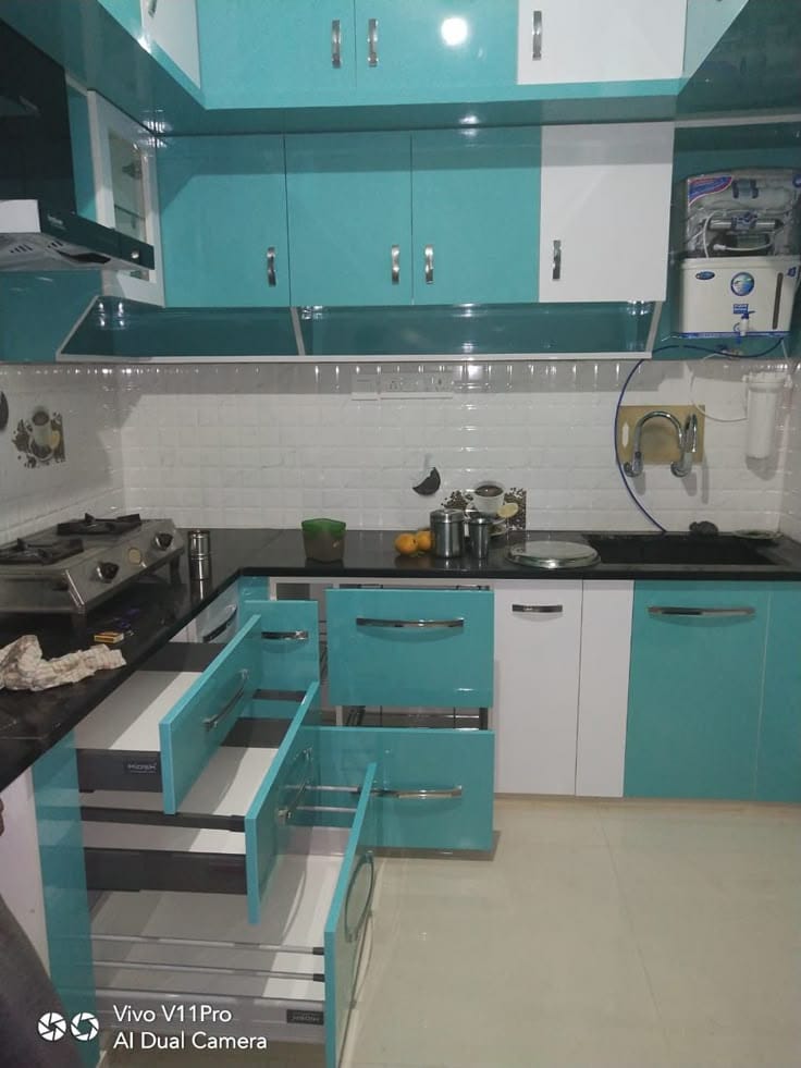 Modular kitchen installation by KGN Interior Factory